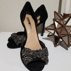 Black suede kitten heels with crystal bow